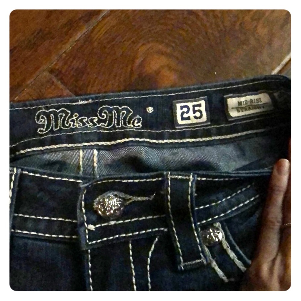 Size 25 Miss Me mid rise jeans.